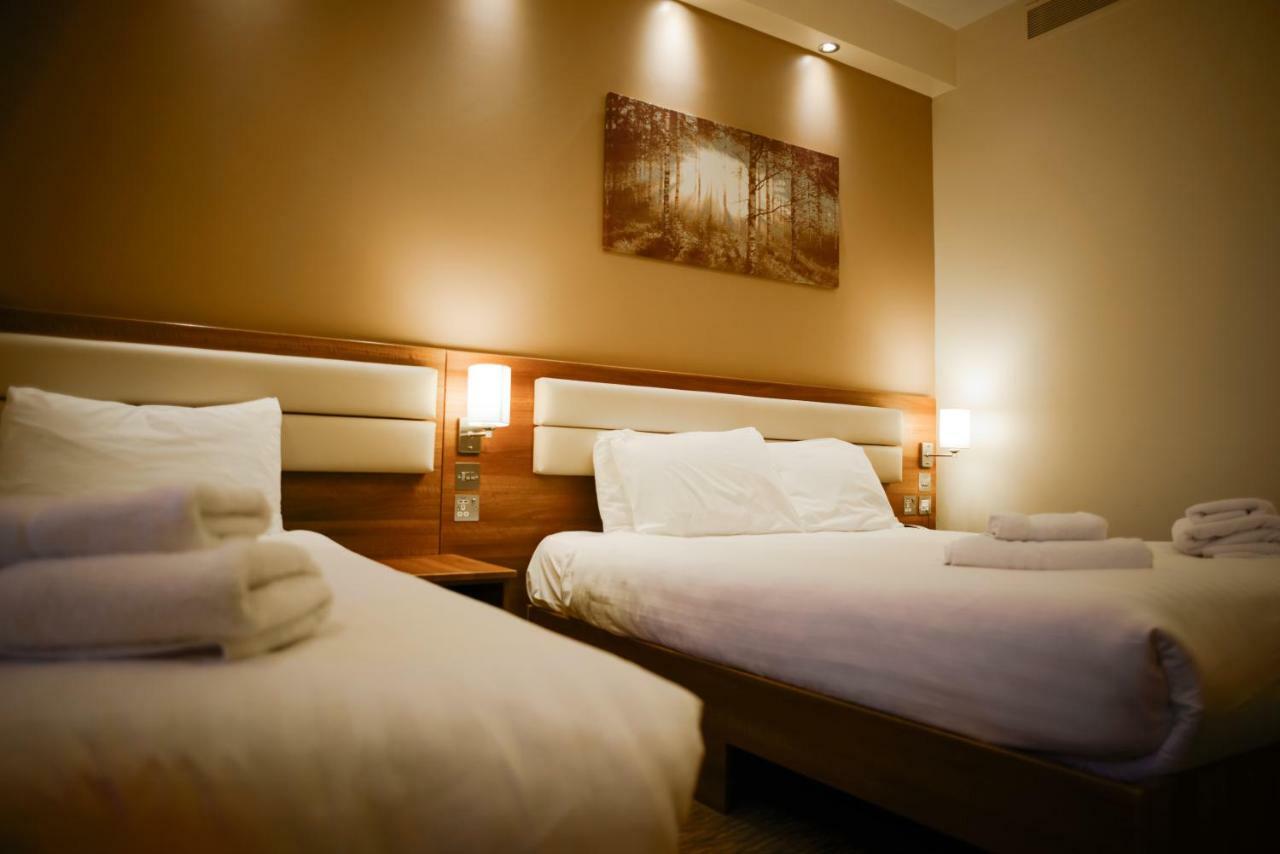 Airlink Hotel Хейс Экстерьер фото